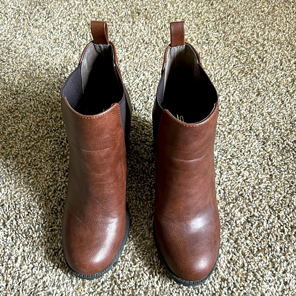 Brown and black booties